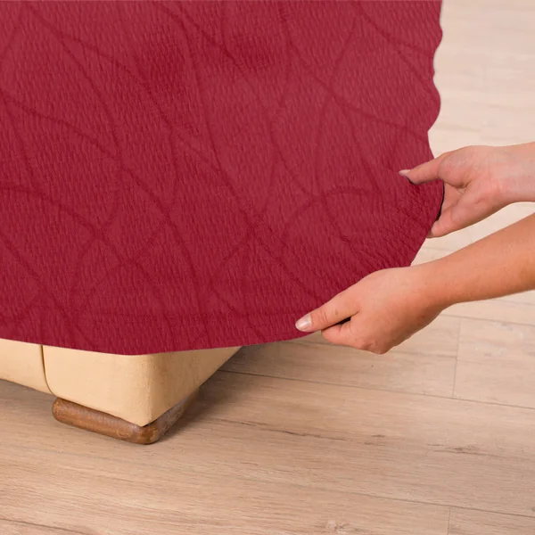 Housse extensible motif jacquard "serpentins" pour fauteuil et canapé , rouge