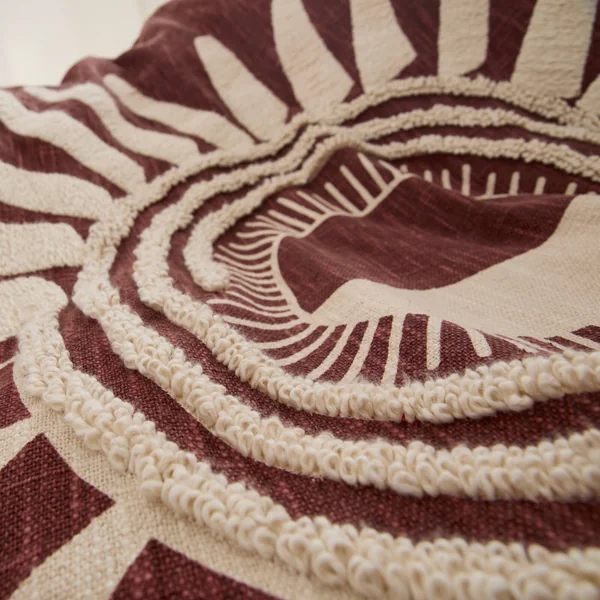 Plaid texturé motif soleil, bordeaux / écru