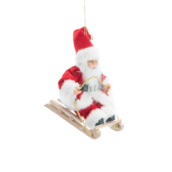 Père Noël traditionnel en tissu rouge et vert sur luge - 18 cm