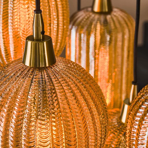 Suspension moderne en verre 7 lampes Ambrine